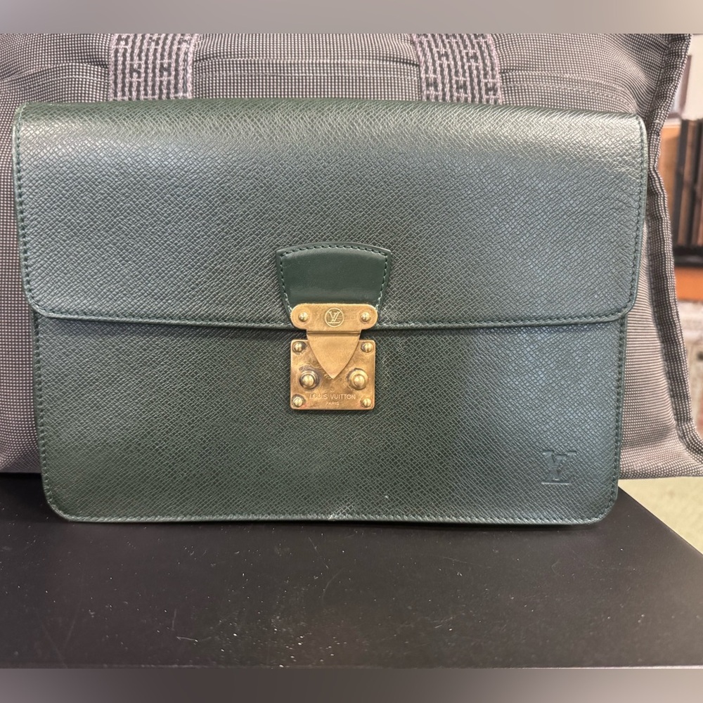 Louis Vuitton Tiaga Leather Clutch